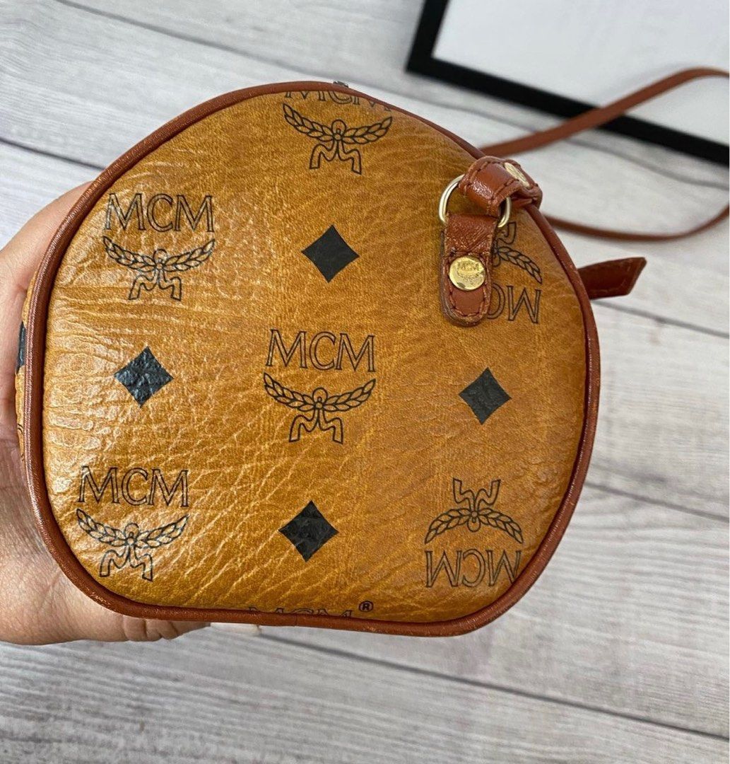 MCM crossbody bag (Category: Luxury Bags & Wallets) located in Paranaque City. Submitted by jenniferj97672 (Listing ID 1270242647, Image 3). Description: MCM crossbody bag 9000.00 Color: brown 🤎 Material : PVC Leather Size(cm) : W24cm x H13cm x D12cm(Approx) Size(inch) : W9.4 x H5.1 x D4.7inch(Approx) Condition: Very good ✨ Seller’s note: “clean in and out” Disclaimer: All items are original, luxury pre-owned items. Money back guarantee if prove