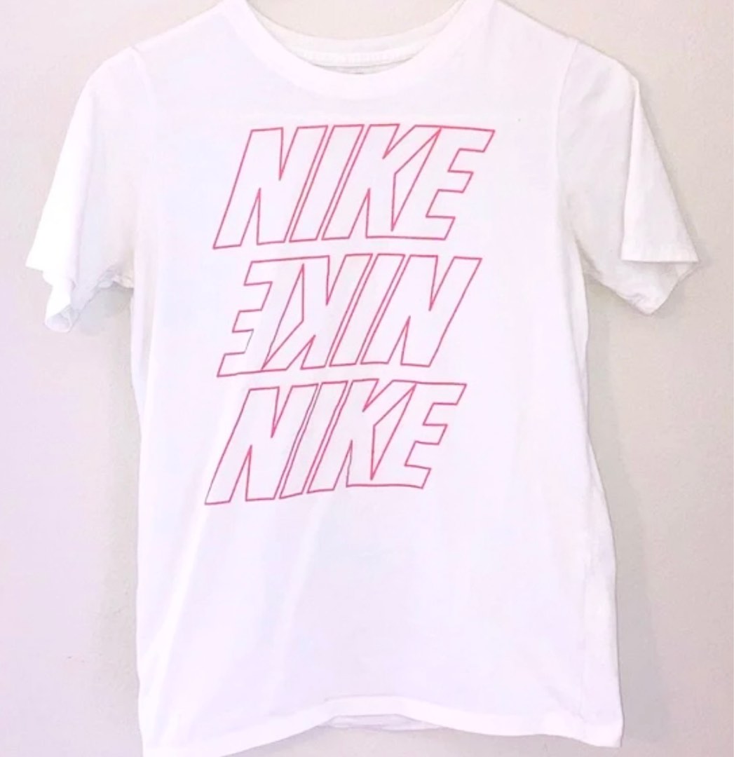 White nike shirt with pink logo on sale