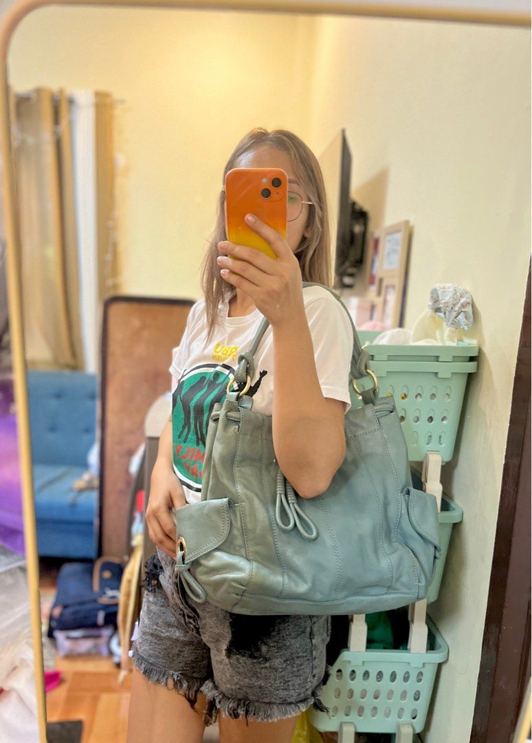 Preloved Original MK Michael Kors Bag (Category: Luxury Bags & Wallets) located in Davao. Submitted by stellietas (Listing ID 1270139780, Image 2). Description: Has some flaws: see photos, more photos upon request. Yung color nyan may pag ka ombre na powder blue or pag ka mint green Makapal leather Original MK Malinis loob like new Hardware still in excellent condition .