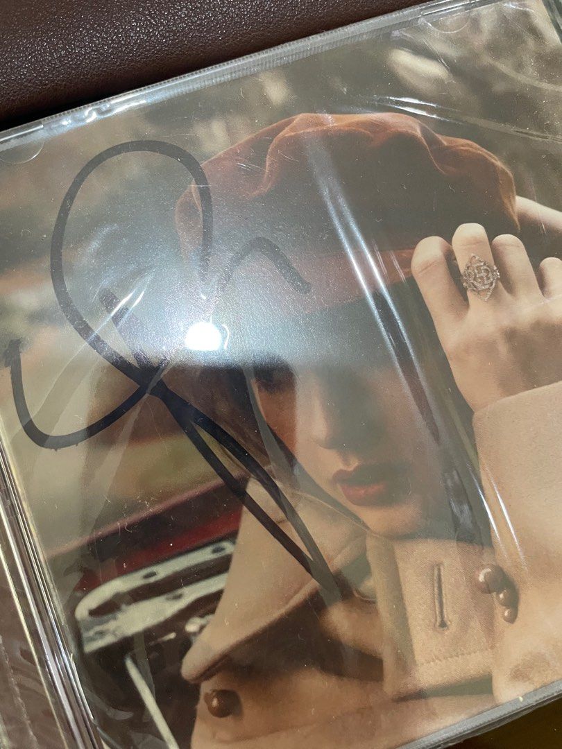 Taylor Swift Signed RED CD (Category: CDs & DVDs) located in Manila. Submitted by stefandraboutique (Listing ID 1270102501, Image 2). Description: on hand and ready to ship taylor swift signed red cd 🥰.