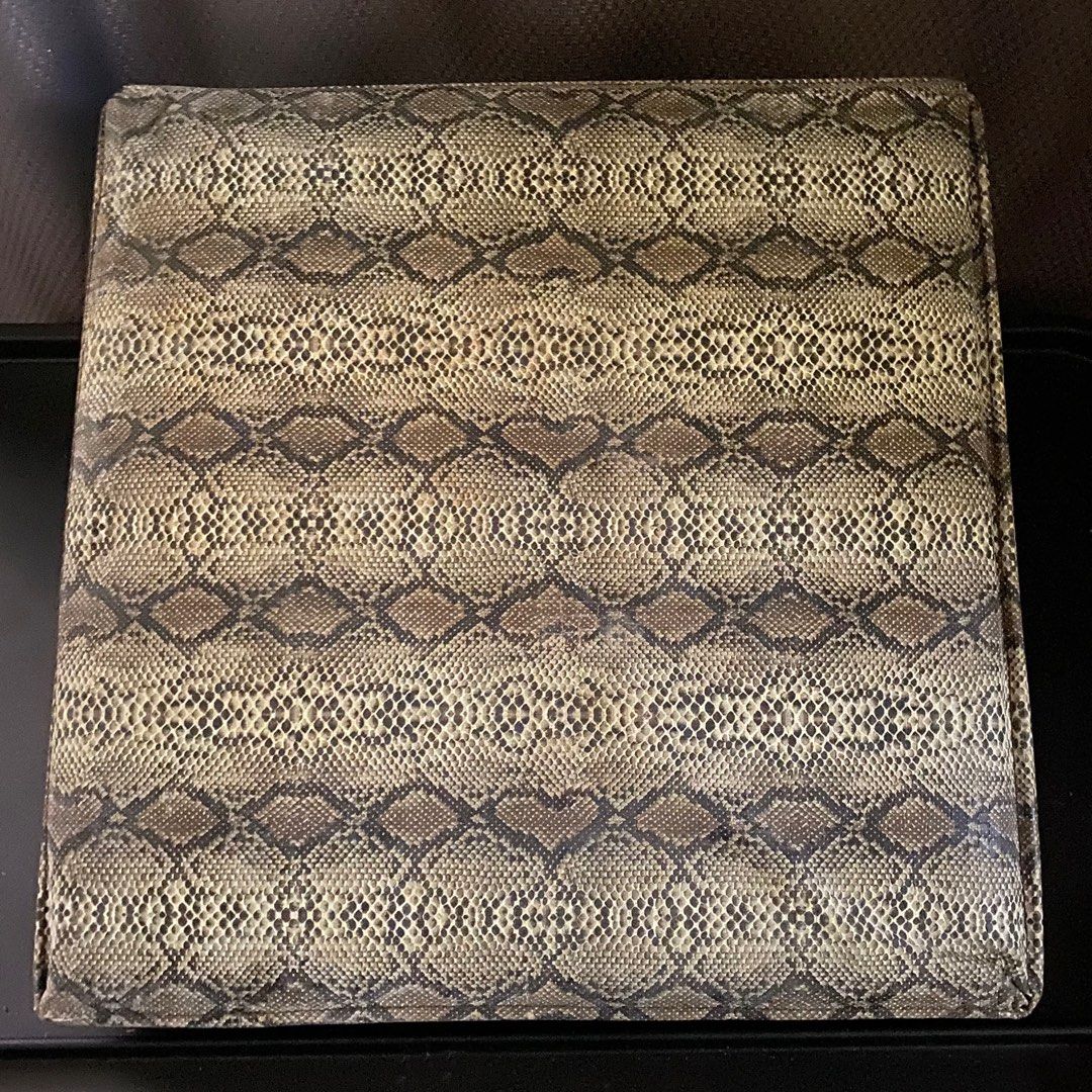 OTTOMAN - SMALL STORAGE STOOL - MULTIFUNCTIONAL SNAKE PRINT FOLDABLE STORAGE STOOL IN BROWN (Category: Storage Boxes & Baskets) located in Taguig. Submitted by thatswhatshesells (Listing ID 1270354677, Image 2). Description: - Brand New - Snake Print Small Storage Bin/ Stool - Ottoman - Multifunctional - Measures: 30x30x30 - Material: Leather Snake Cover; Canvas Bottom - MOP: BDO; GCash - Delivery c/o Buyer - No Return; No Exchange.