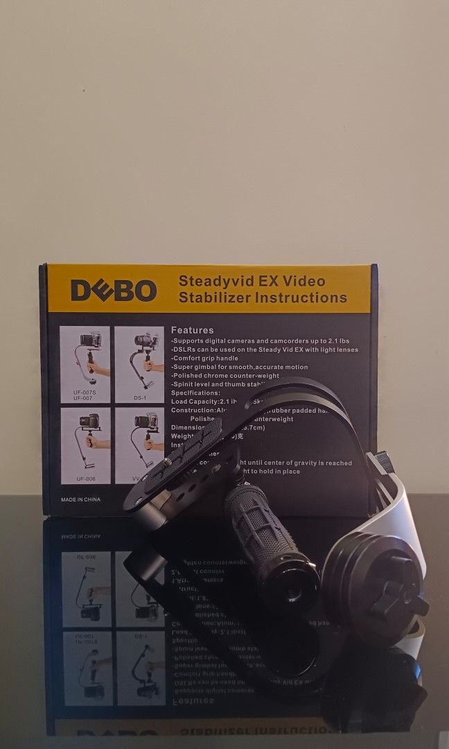 DEBO DSLR Handheld Stabilizer (Category: Gimbals & Stabilizers ) located in Plaridel. Submitted by rai.dln (Listing ID 1270294303, Image 1). Description: Debo Video Stabilizer • with box.