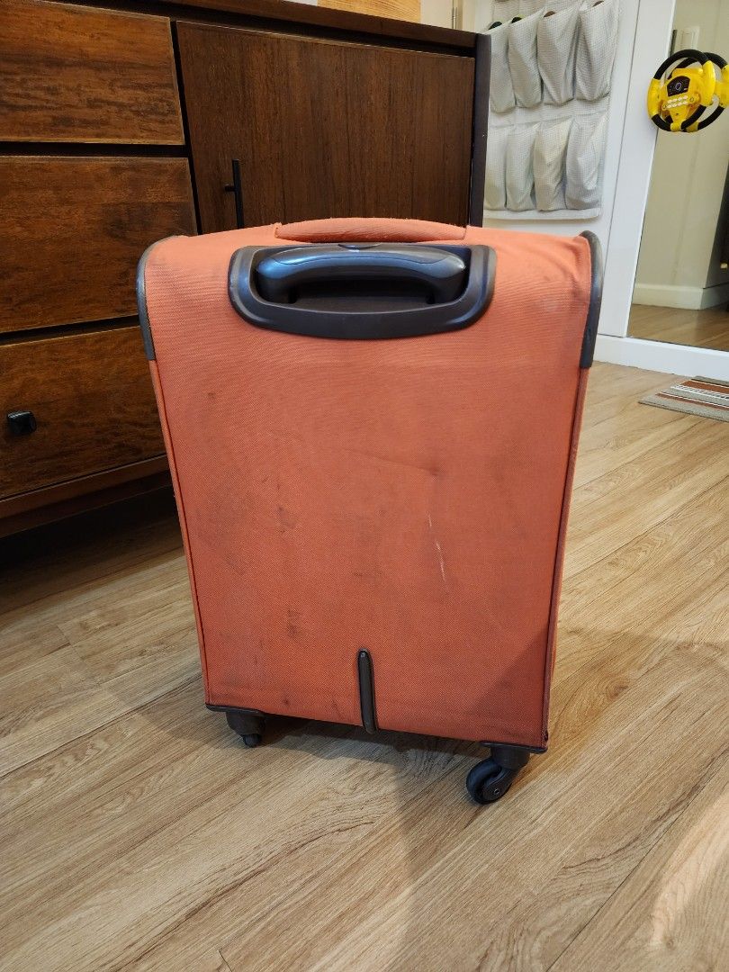 Eminent Cabin Luggage - Orange (Category: Luggage) located in Pasig City. Submitted by pepperoo (Listing ID 1270415677, Image 3). Description: Designed for family looking for extreme lightness and casual design with Vivid colors! KEY FEATURES : Main compartment interlocking sliders, Front zip pocket interlocking sliders, TSA combination padlock, Reinforced injection-moulded plastic corners, expandable, Rear protection plate,Ultra comfortable top 