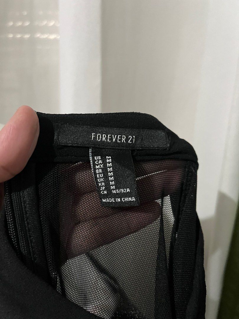 Forever21 black back see through dress (Category: Dresses) located in Makati City. Submitted by joycesp (Listing ID 1270282656, Image 3). Description: .