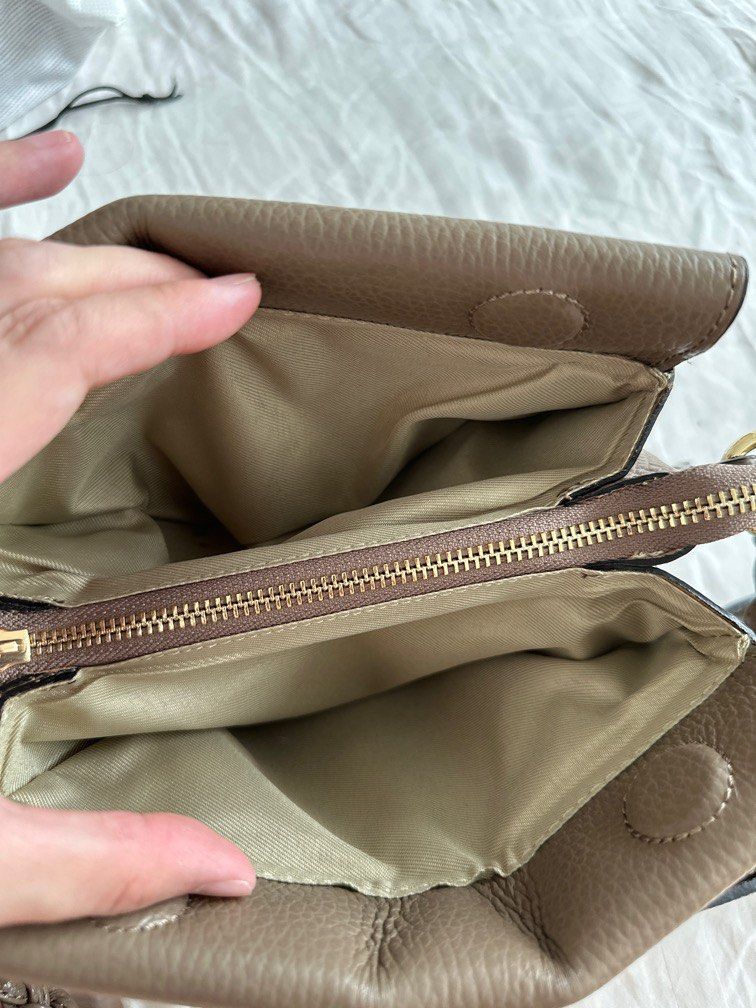 Quilted leather shop clutch bag