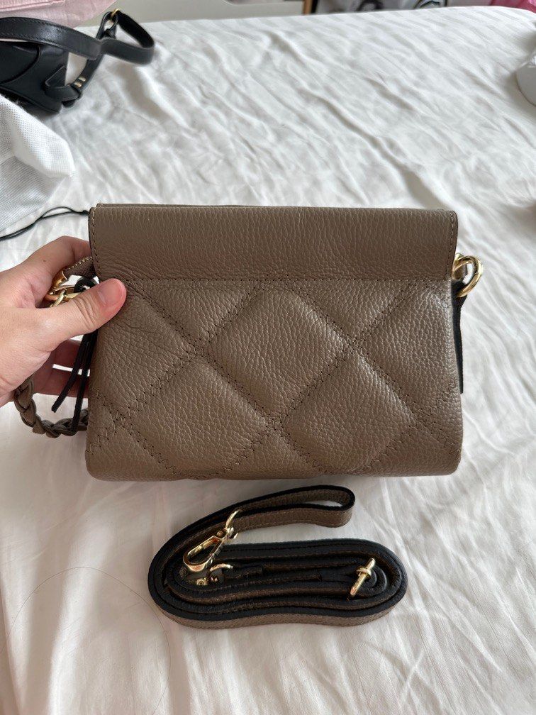 Quilted leather sales clutch bag