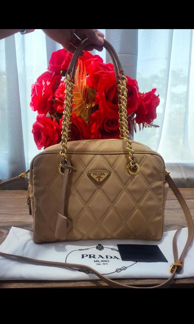 Japan Preloved Prada Two -way (Category: Luxury Bags & Wallets) located in Cebu City. Submitted by day.98 (Listing ID 1270259760, Image 1). Description: selected from japan bag nailon leather codes & etikita no flaws with dust bag.