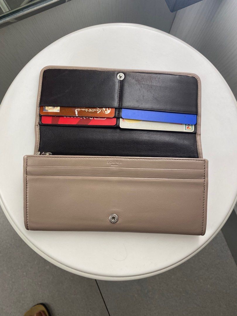 Loewe long wallet (Category: Luxury Bags & Wallets) located in Marikina City. Submitted by whostoledcookiefrmdcookiejar (Listing ID 1270435042, Image 3). Description: Authentic. Used and in good condition, leather is soft and buttery. Color refreshed at The Bag Compartment Katipunan. No inclusions. Replaced zipper pull on the interior zip. Normal signs of usage, a couple of rubs on one side only. Payment: BPI/Unionbank/Gcash Shipping: Grab/Lalamo
