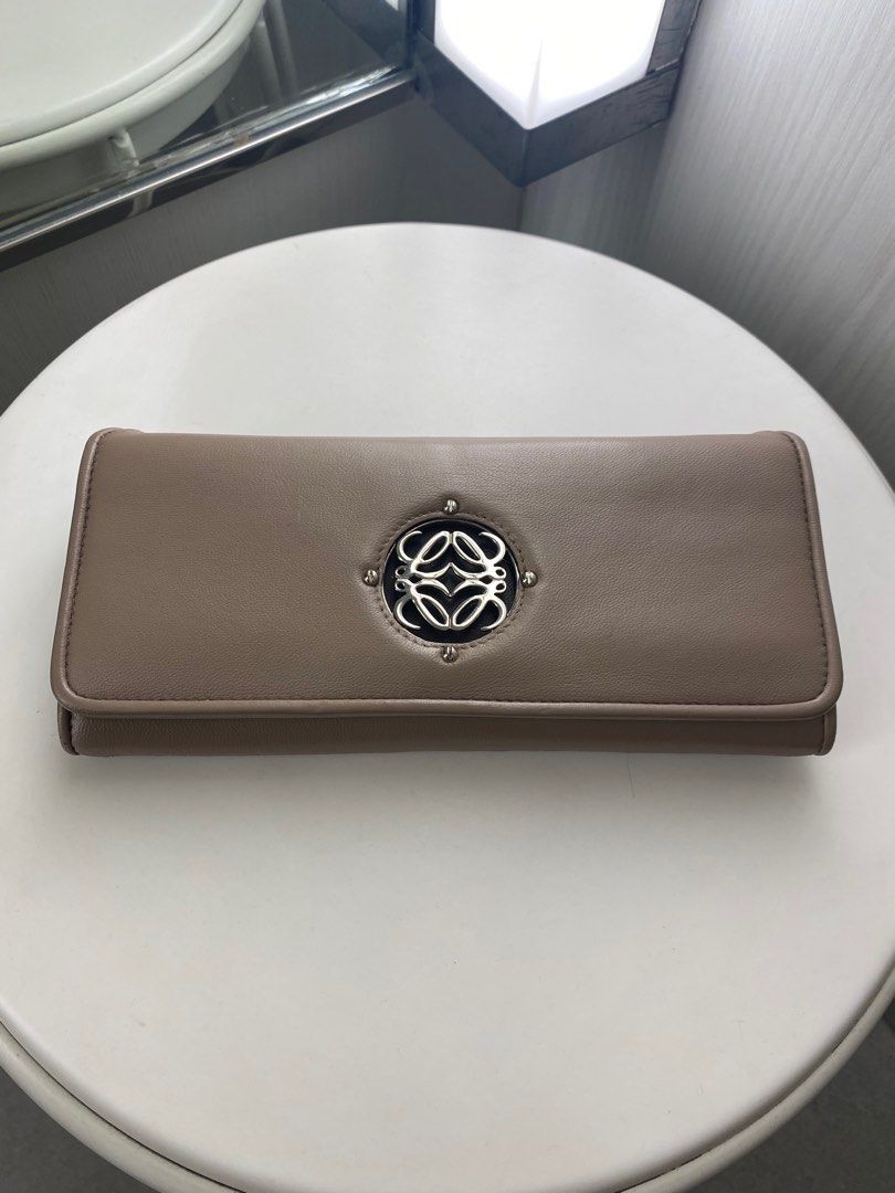 Loewe long wallet (Category: Luxury Bags & Wallets) located in Marikina City. Submitted by whostoledcookiefrmdcookiejar (Listing ID 1270435042, Image 1). Description: Authentic. Used and in good condition, leather is soft and buttery. Color refreshed at The Bag Compartment Katipunan. No inclusions. Replaced zipper pull on the interior zip. Normal signs of usage, a couple of rubs on one side only. Payment: BPI/Unionbank/Gcash Shipping: Grab/Lalamo