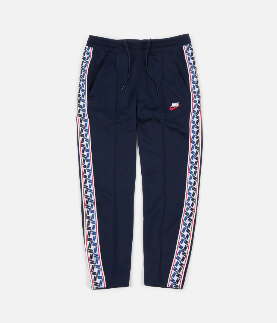 NIKE Taped Poly Track Pants Size XL Men s Fashion Bottoms Trousers on Carousell