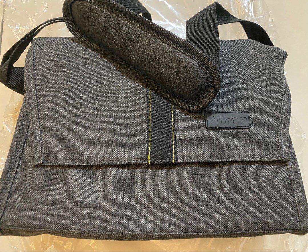 Nikon Camera Bag with FREE Nikon camera strap (Category: Camera Bags & Carriers) located in Paranaque City. Submitted by carsal (Listing ID 1270404357, Image 1). Description: Brand new Nikon camera bag With divider, shoulder strap, drawstring for internal closure before flap closure of the bag, pocket Payment to Gcash QR code is needed before reservation. First payment received gets the item reserved. Courier available are only the ones listed he