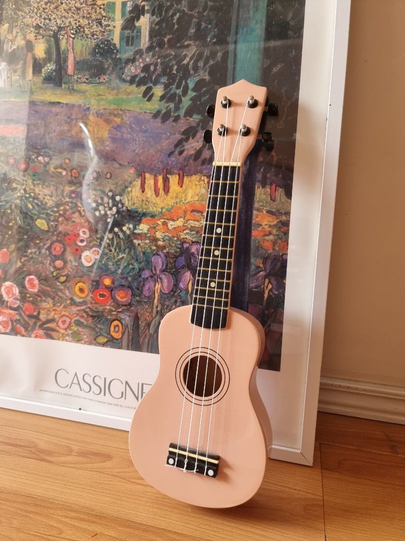 Pretend Ukelele, Miniature Guitar from Cebu (Category: Musical Instruments) located in Bulacan. Submitted by iamolivia_p (Listing ID 1270290242, Image 2). Description: With adjustable strings.