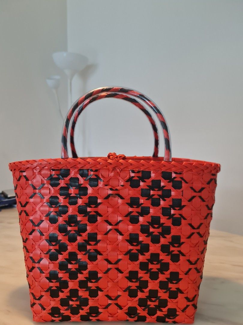 Red and black woven bag