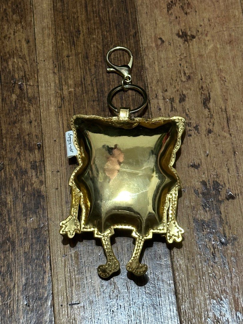 SpongeBob Gold Bag Charm/ Key Chain (Category: Other Accessories) located in Quezon City. Submitted by mikkos_closet (Listing ID 1270411098, Image 1). Description: Dark gold in actual. .