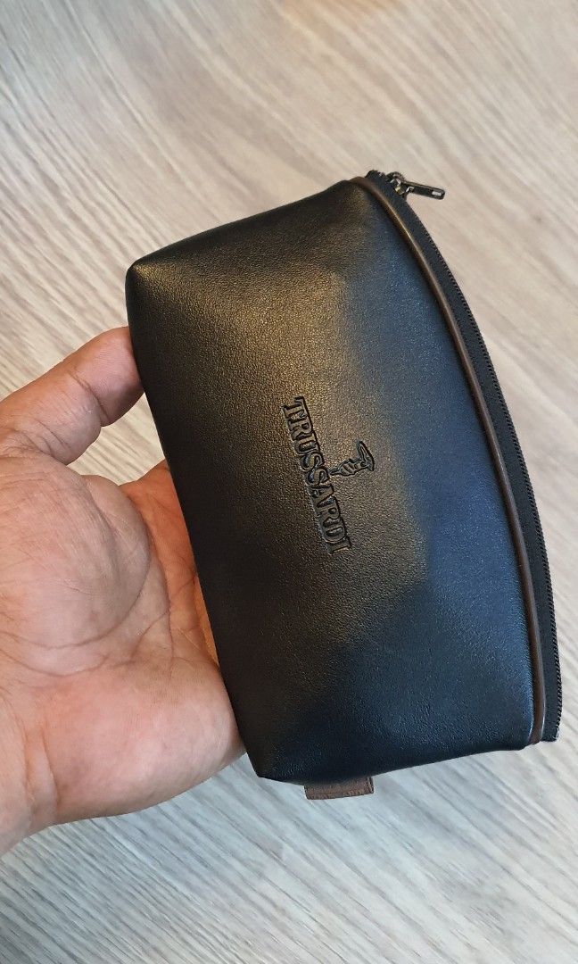 Authentic trussardi pouch (Category: Luxury Bags & Wallets) located in Cavite. Submitted by ohmie23 (Listing ID 1212801323, Image 1). Description: Authentic trussardi pouch.