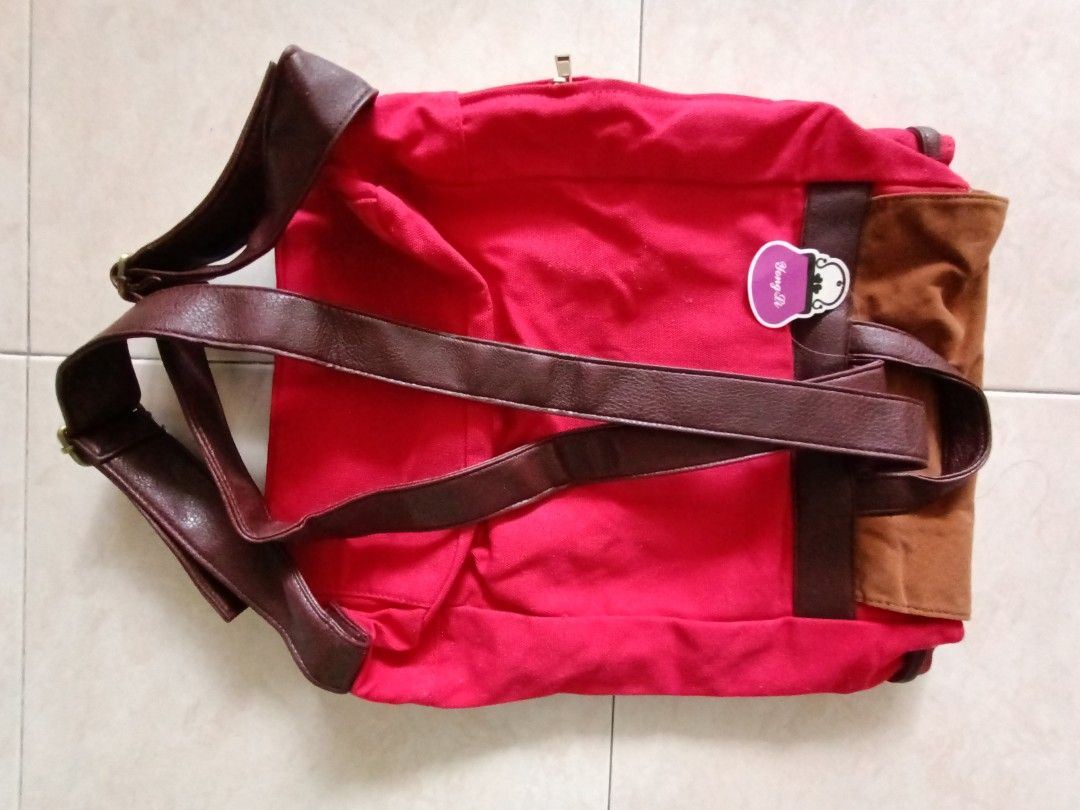 Backpack (Category: Backpacks) located in Singapore. Submitted by astra5 (Listing ID 1212703473, Image 6). Description: brand-new backpack with many compartments. tag still intact.