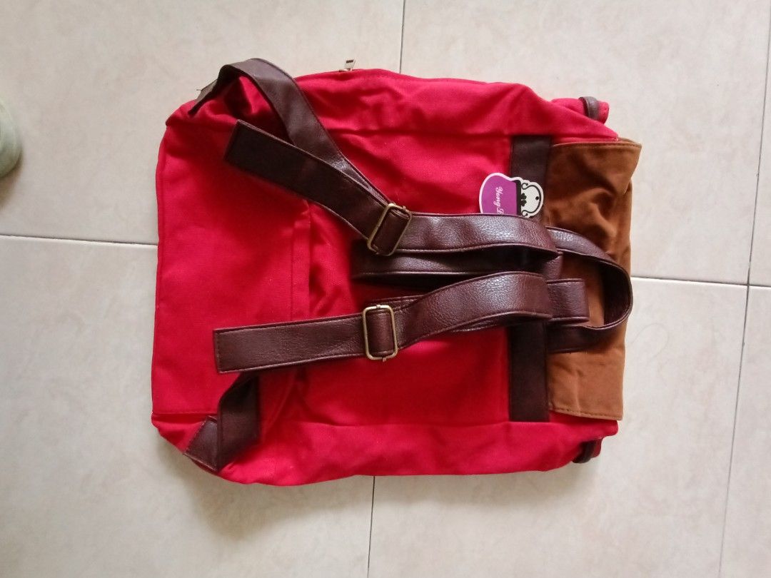 Backpack (Category: Backpacks) located in Singapore. Submitted by astra5 (Listing ID 1212703473, Image 5). Description: brand-new backpack with many compartments. tag still intact.