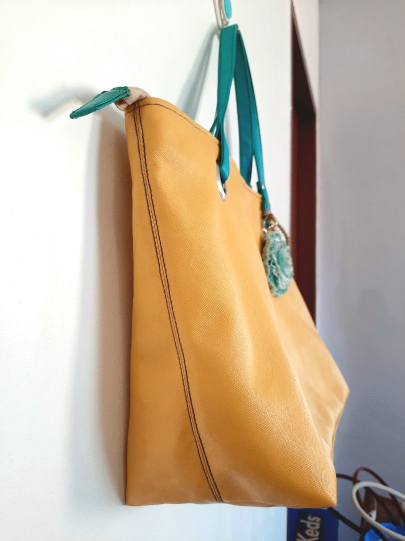 ⚜️EGG Summer Yellow Tote Bag Shoulder Bag (Category: Tote Bags) located in Paranaque City. Submitted by adoptastuff (Listing ID 1212730075, Image 3). Description: 💎PLS READ BELOW💎 - Condition: relatively good (newly cleaned) - Has 1 main zippered compartment & 1 inner zippered pocket - Size: length 16.5", height 10.5" - Purchase price P700 - Actual photos listed - Pro tip: combine this with other items from my shop para sulit sf 😉👇🏻https://w