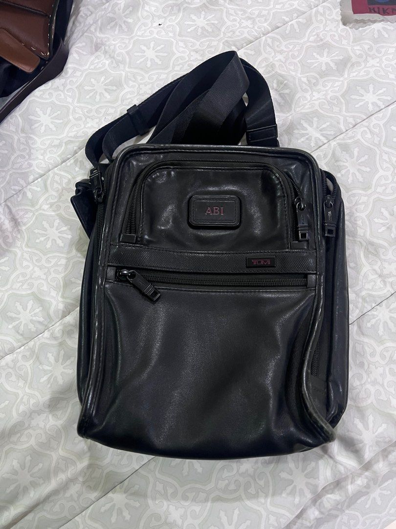 Tumi leather handbag discount