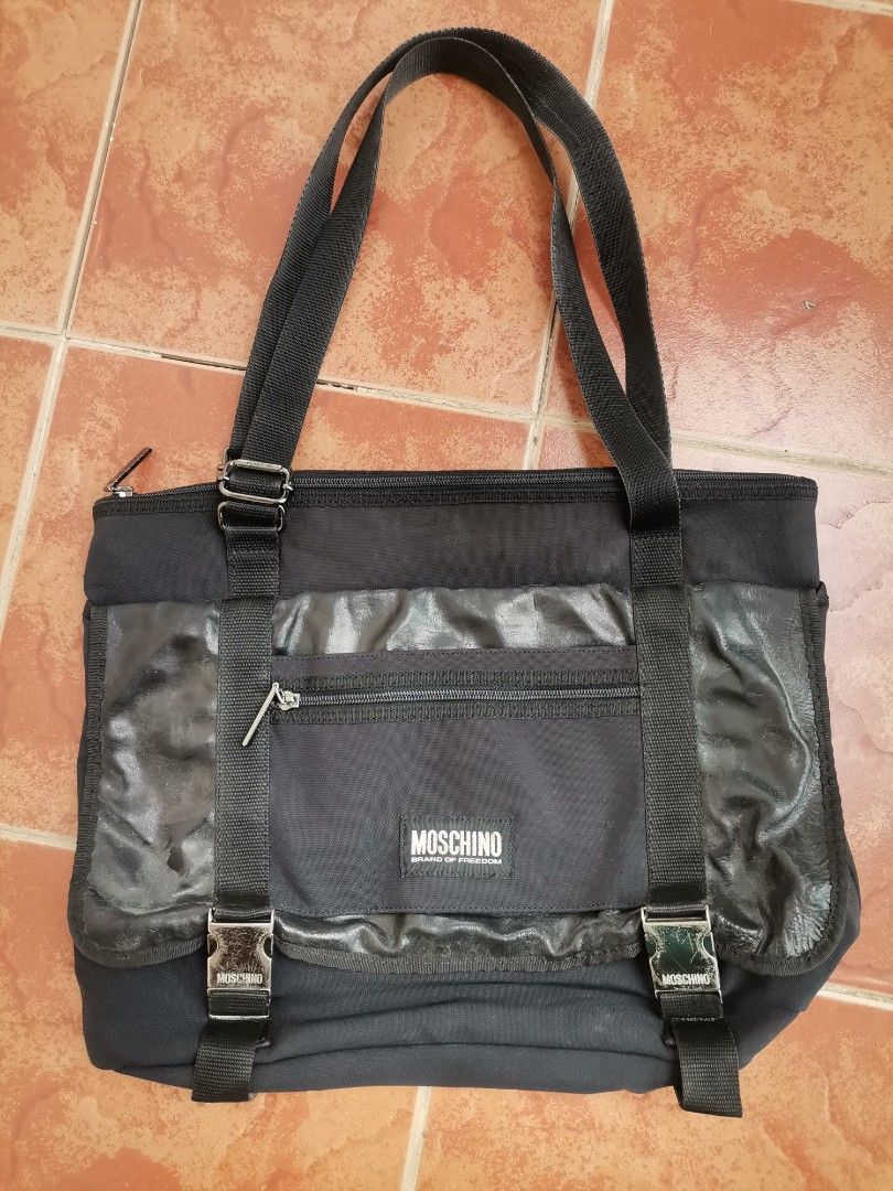 Vintage Moschino Tote Bag (Category: Luxury Bags & Wallets) located in Kabankalan. Submitted by negrosxthriftz (Listing ID 1212630070, Image 1). Description: Authentic Vintage Moschino Issues: Scratches see pics for reference.