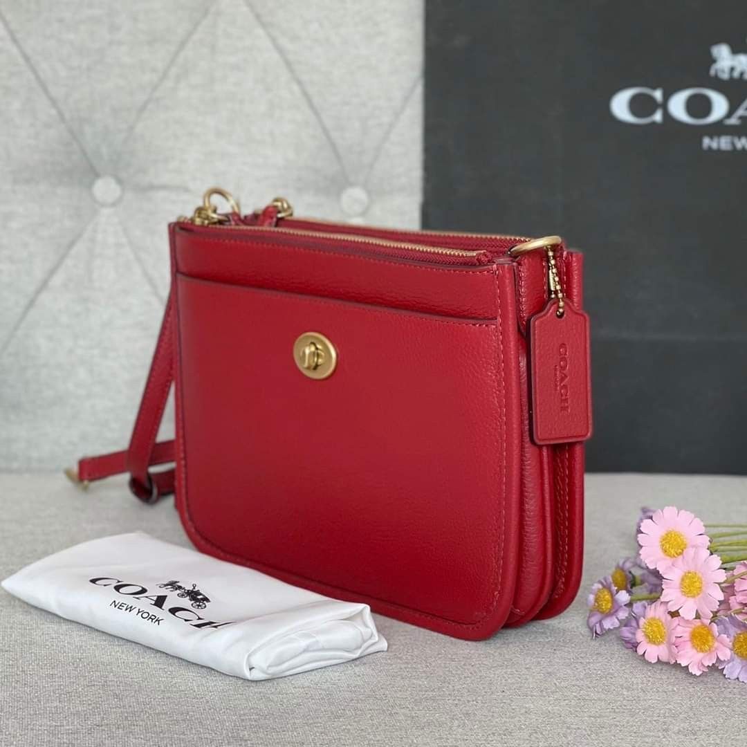 Coach Slim Turnlock Crossbody - Red (Category: Luxury Bags & Wallets) located in Bulacan. Submitted by watchabagsph2.0 (Listing ID 1214444092, Image 2). Description: 📍with Tag, Dustbag Paper Bag (OPEN FOR LAYAWAY, MESSAGE US FOR DETAILS) Note: Color may slightly vary in actual due to lighting, angle and background used during photoshoot. #watchabagsxcoach.