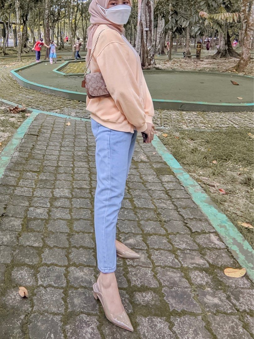 Light store orange cardigan