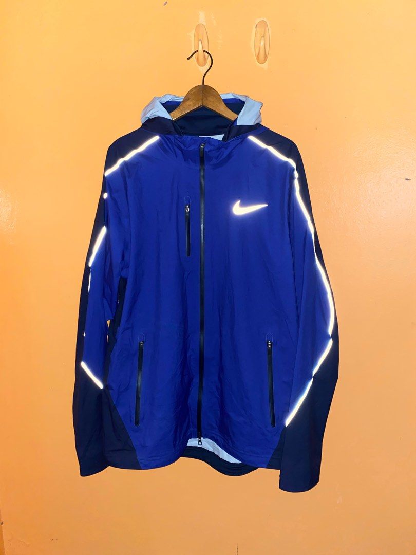 NIKE WINDBREAKER (Category: Coats, Jackets and Outerwear) located in Manila. Submitted by helufattyyy (Listing ID 1214509645, Image 1). Description: NIKE LARGE WIDTH 22 LENGTH 27 LONGBACK 29 GOOD AS NEW NO ISSUES BUY NA 🙂.