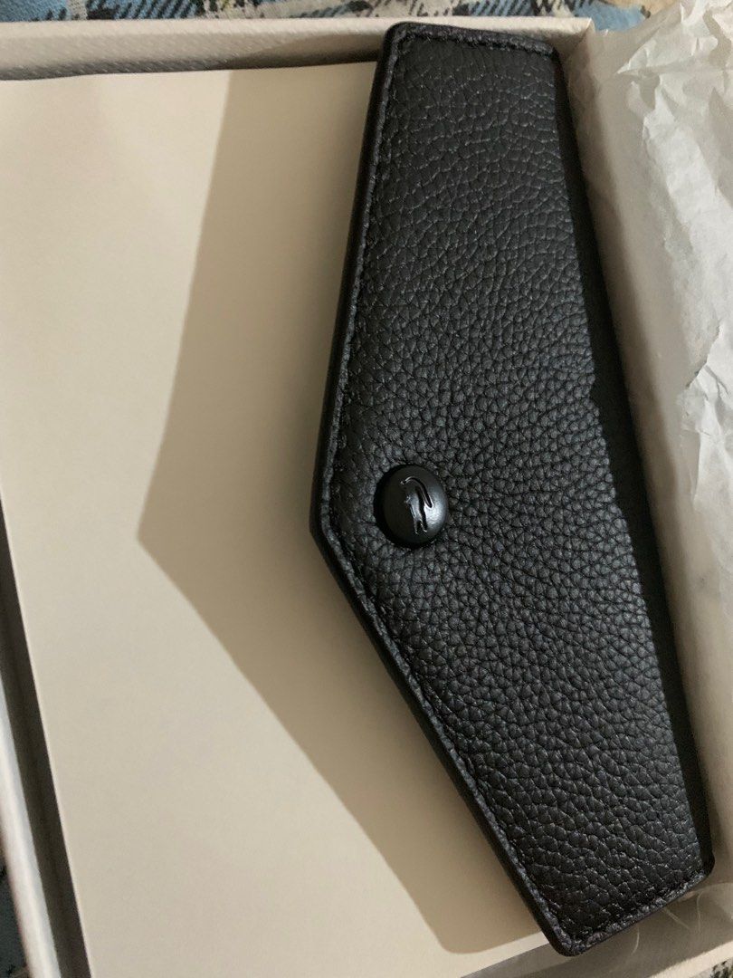 Original lacoste passport wallet, Luxury, Bags & Wallets on Carousell