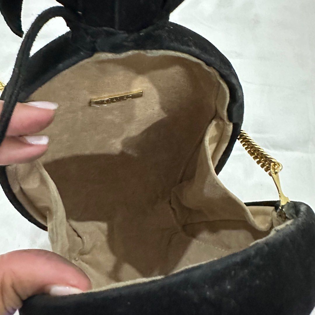Aranaz Piña Suede Clutch with Gold Chain Strap (Category: Clutches) located in Paranaque City. Submitted by agl.ph (Listing ID 1214616273, Image 2). Description: Purchased for around 9k Suede leather Used around two times only Has been stored for a long time, with minimal marks from storage Comes with dust bag Height 7” Length 5.5” Width 2.5”.
