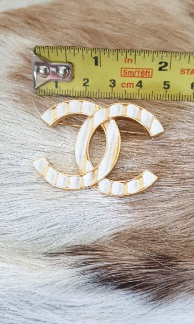 Authentic CHANEL Paris gold & white brooch - Cruise 2023 model, just  released. Directly store bought. Complete, inclusions on photos, Women's  Fashion, Jewelry & Organizers, Brooches on Carousell