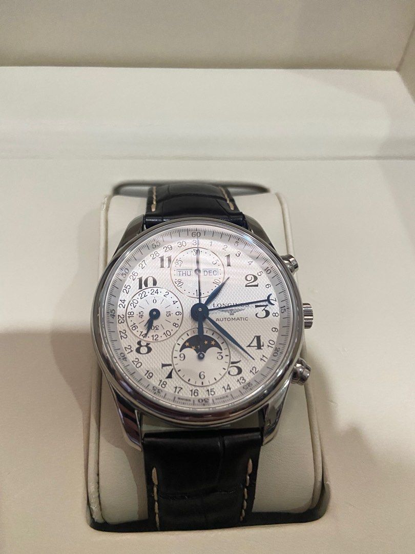 Longines Master Collection Moonphase (Category: Luxury Watches) located in Cebu City. Submitted by sbstn096 (Listing ID 1214613472, Image 1). Description: Longines Master Collection Condition: lightly used with minor scratches Dimension: 40mm Lug distance: 21mm Water resistance: water resistant to 3 bar Movement: Automatic Caliber L687 Thickness: 14.30mm Dial Colour: silver “barleycorn” Material: stainless steel Glass: Scratch-Resistant Sapphire 