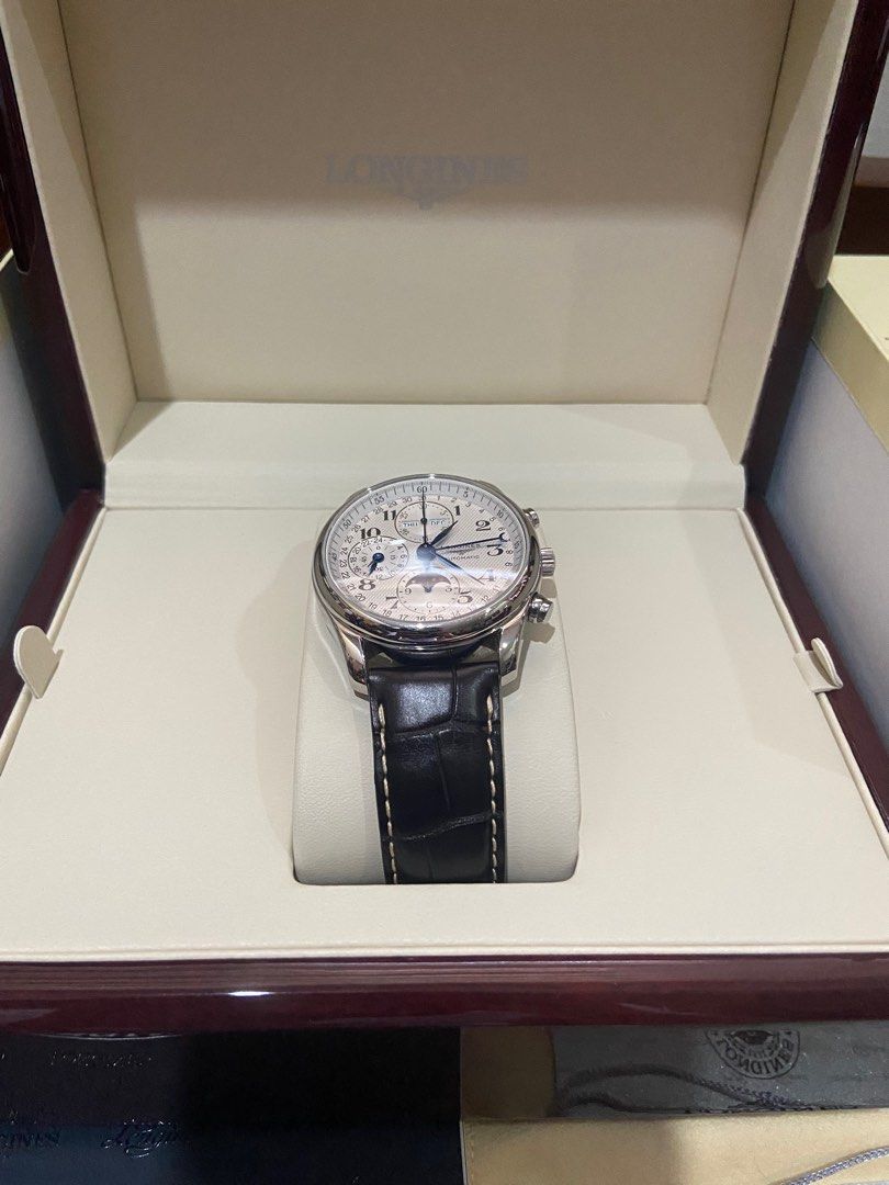 Longines Master Collection Moonphase (Category: Luxury Watches) located in Cebu City. Submitted by sbstn096 (Listing ID 1214613472, Image 3). Description: Longines Master Collection Condition: lightly used with minor scratches Dimension: 40mm Lug distance: 21mm Water resistance: water resistant to 3 bar Movement: Automatic Caliber L687 Thickness: 14.30mm Dial Colour: silver “barleycorn” Material: stainless steel Glass: Scratch-Resistant Sapphire 