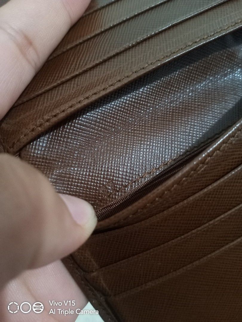 orig.prada wallet for men (Category: Luxury Bags & Wallets) located in Tagum. Submitted by luxbagelyas (Listing ID 1214618637, Image 3). Description: with sign of use no major flaws good condition minimal rubs sa corners Japan source.