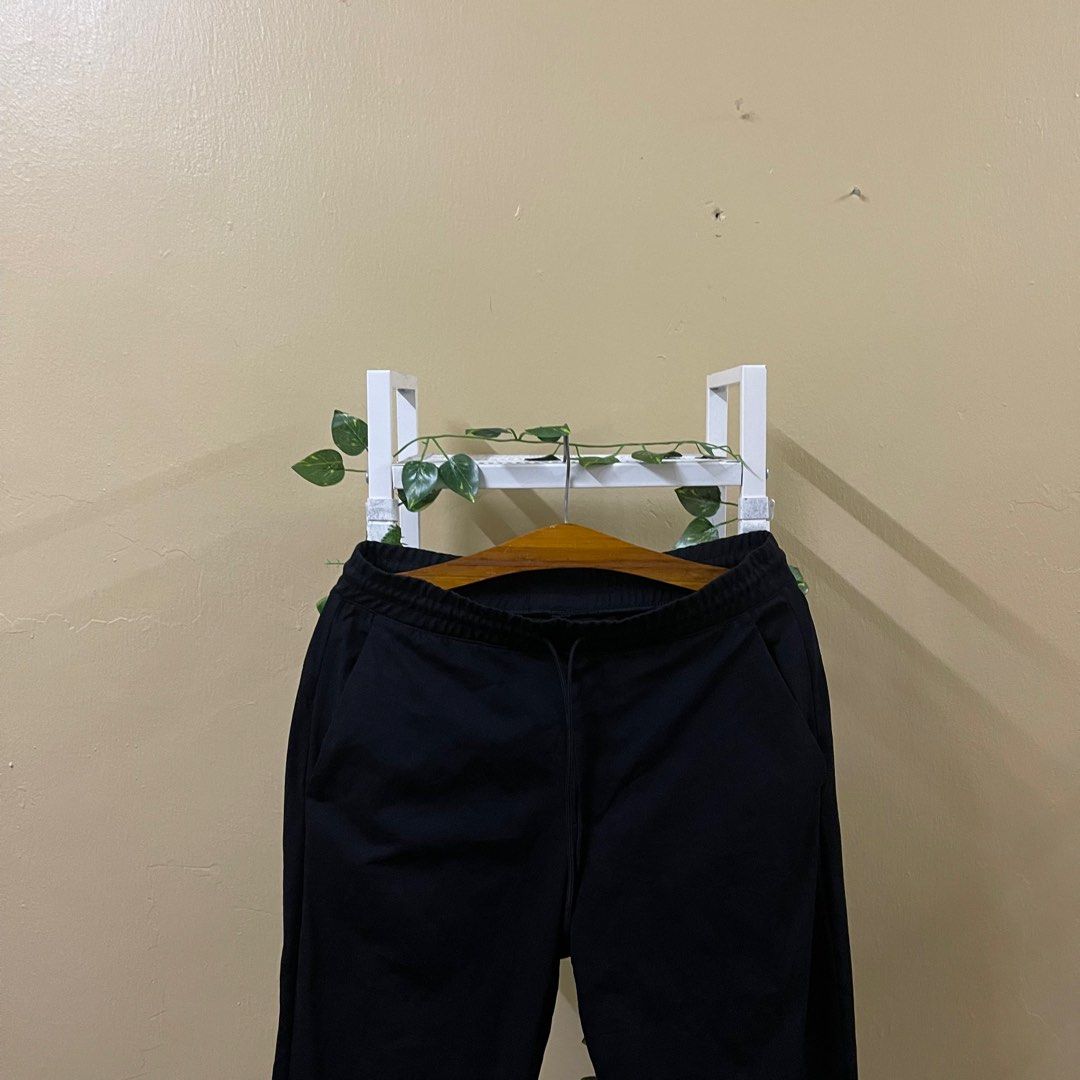 Uniqlo track pants black, Men's Fashion, Bottoms, Joggers on Carousell