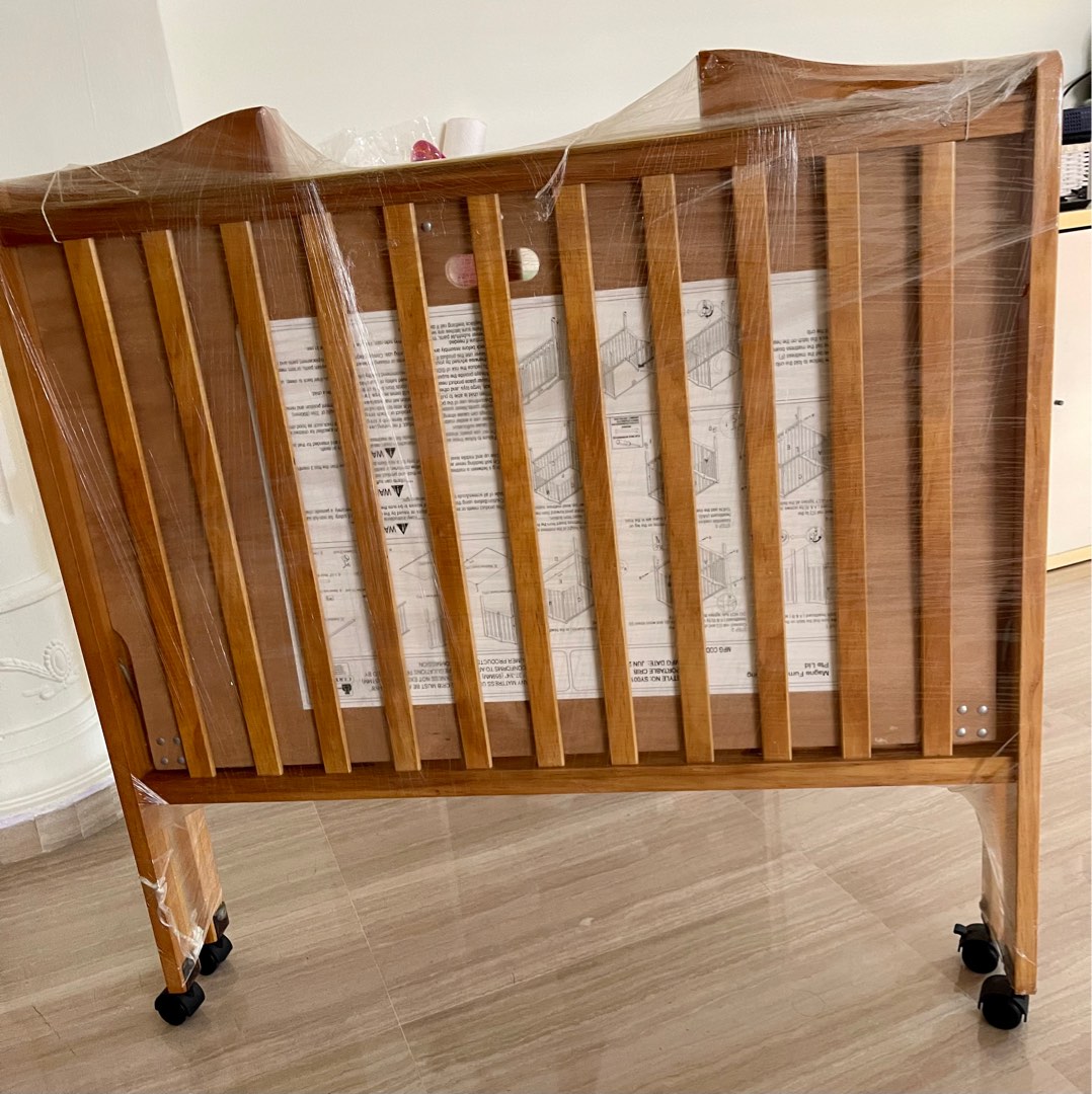 Wooden foldable baby cot with castor and mattress, Babies & Kids, Baby