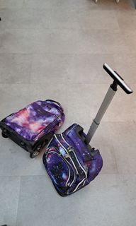 A pair of Tilami backpacks with big wheels