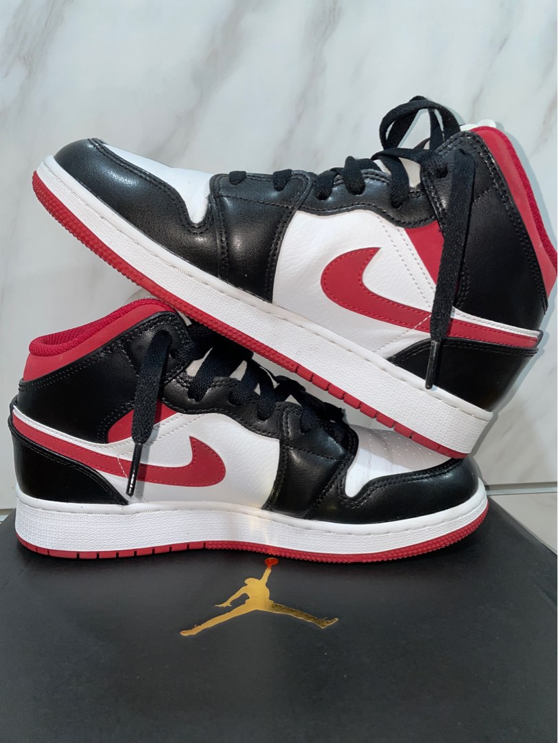 Red mid jordans