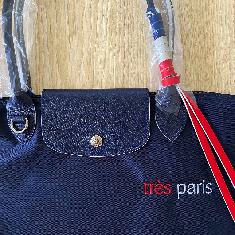 LONGCHAMP PARIS's Instagram post: “The most French thing you'll see today.  The Red and Navy Filet bags are two new exclusive…