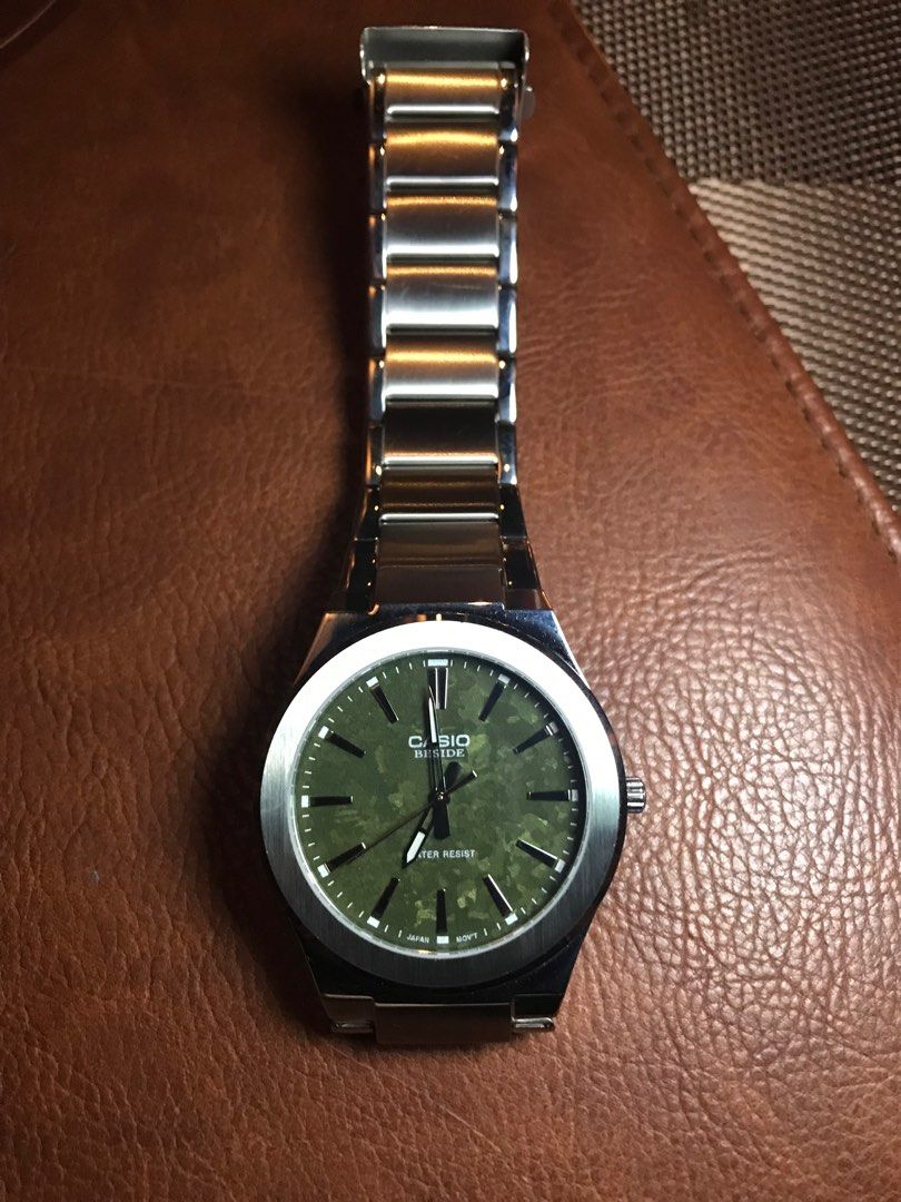 Casio beside green dial online