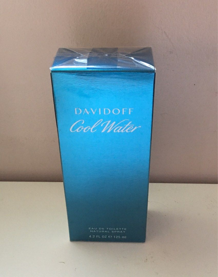 Davidoff COOLWATER for Men EDT 125 mL (Category: Fragrance & Deodorants) located in Malay. Submitted by ScentsPromenade_ (Listing ID 1214919918, Image 1). Description: Authentic Cool Water by Davidoff Eau de Toilette Perfume Spray for Men, 125 ml. Aromatic aquatic fragrance for men. Top notes: rosemary, calone, green notes, mint, sea water, coriander and lavender. Middle notes: neroli, geranium, sandalwood and jasmine. Base notes: tobacco, cedar,