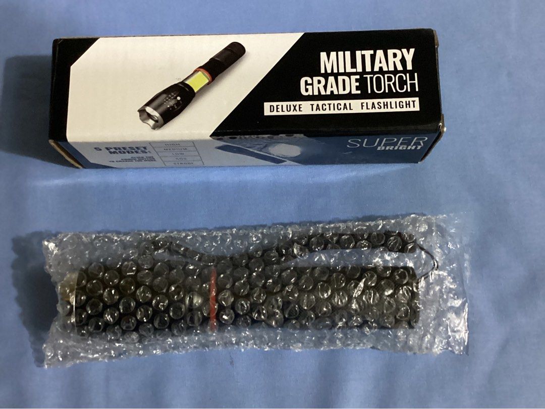 Military Grade Torch (Category: Hiking & Camping) located in Davao. Submitted by ferdipt (Listing ID 1214749053, Image 1). Description: Deluxe Tactical Flashlight Super Bright 5 Preset Modes Waterproof Batteries not included .