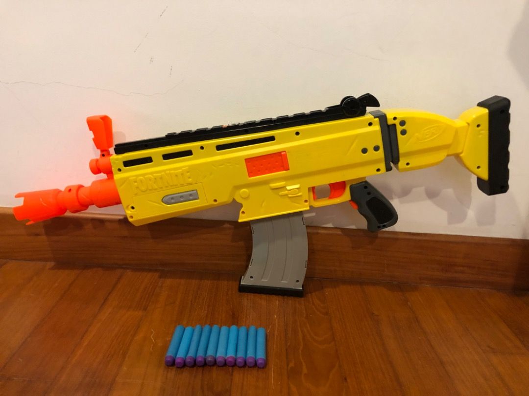 Nerf Fortnite Motorized Blaster with Fortnite Converge Wrap with 10 Elite  Darts 