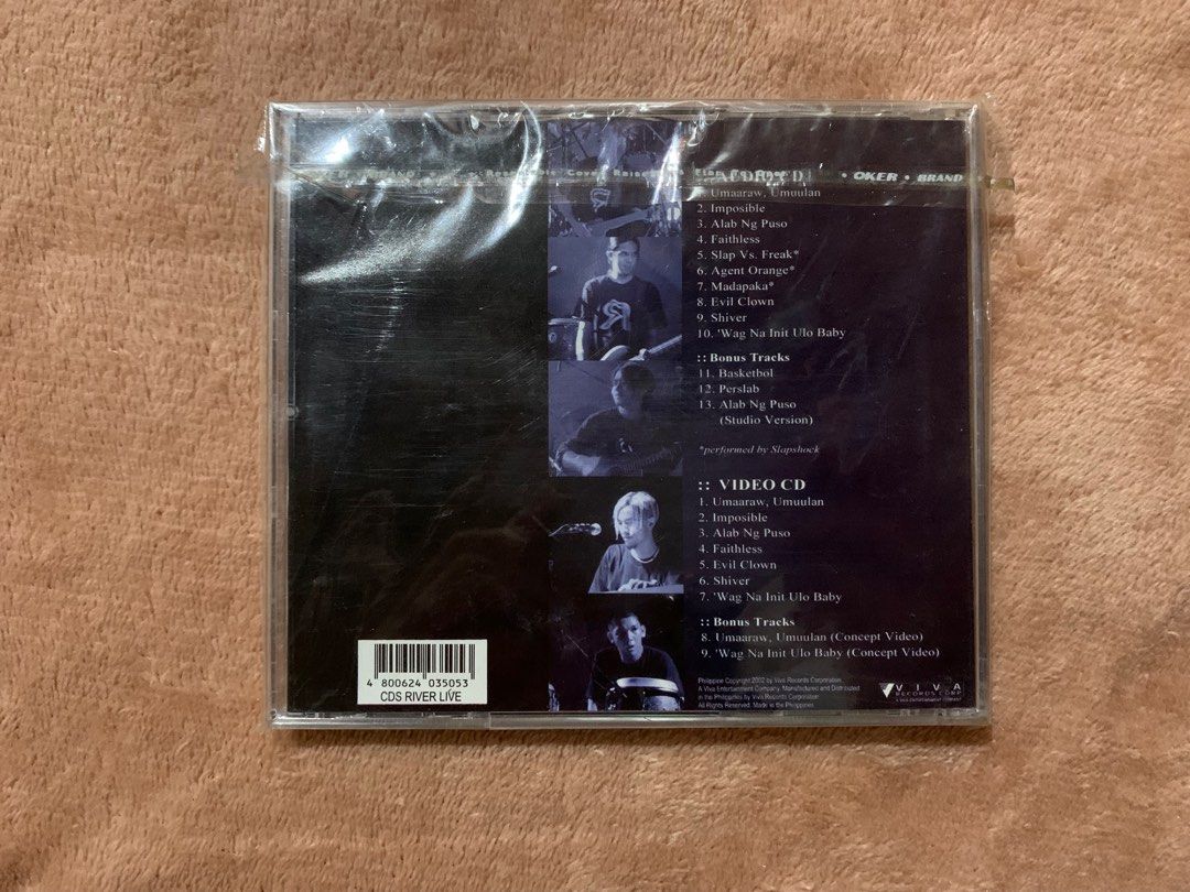 RIVERMAYA LIVE AND ACOUSTIC WITH SLAPSHOCK AVCD (Category: CDs & DVDs) located in Zamboanga. Submitted by ronrocar (Listing ID 1214816100, Image 2). Description: RIVERMAYA LIVE AND ACOUSTIC WITH SLAPSHOCK AVCD Rare/ OUT OF PRINT 1550 plus sf Slightly negotiable NOTE: Item is untested and was kept properly for collection purposes Item may have scratches as well as inlay cards may have tears, cuts, etc PLEASE REFER TO ALL THE PHOTOS //—————————————