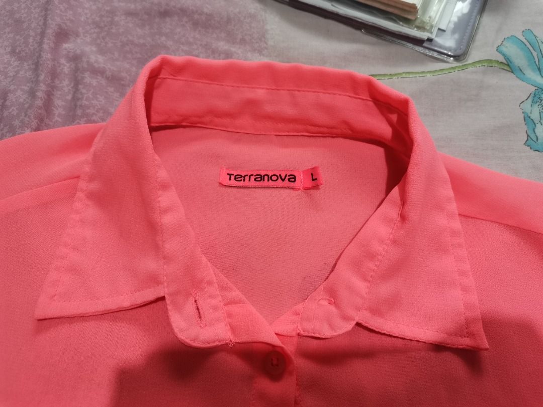 Terranova Sheer Neon Longsleeves Top (Category: Longsleeves) located in Binan City. Submitted by _jennilynred (Listing ID 1214866431, Image 2). Description: Size: L on tag, looks oversized Color: Neon Pink Other details: -Complete buttons -Sleeves can be adjusted, see sample photos when worn RFS: Decluttering.