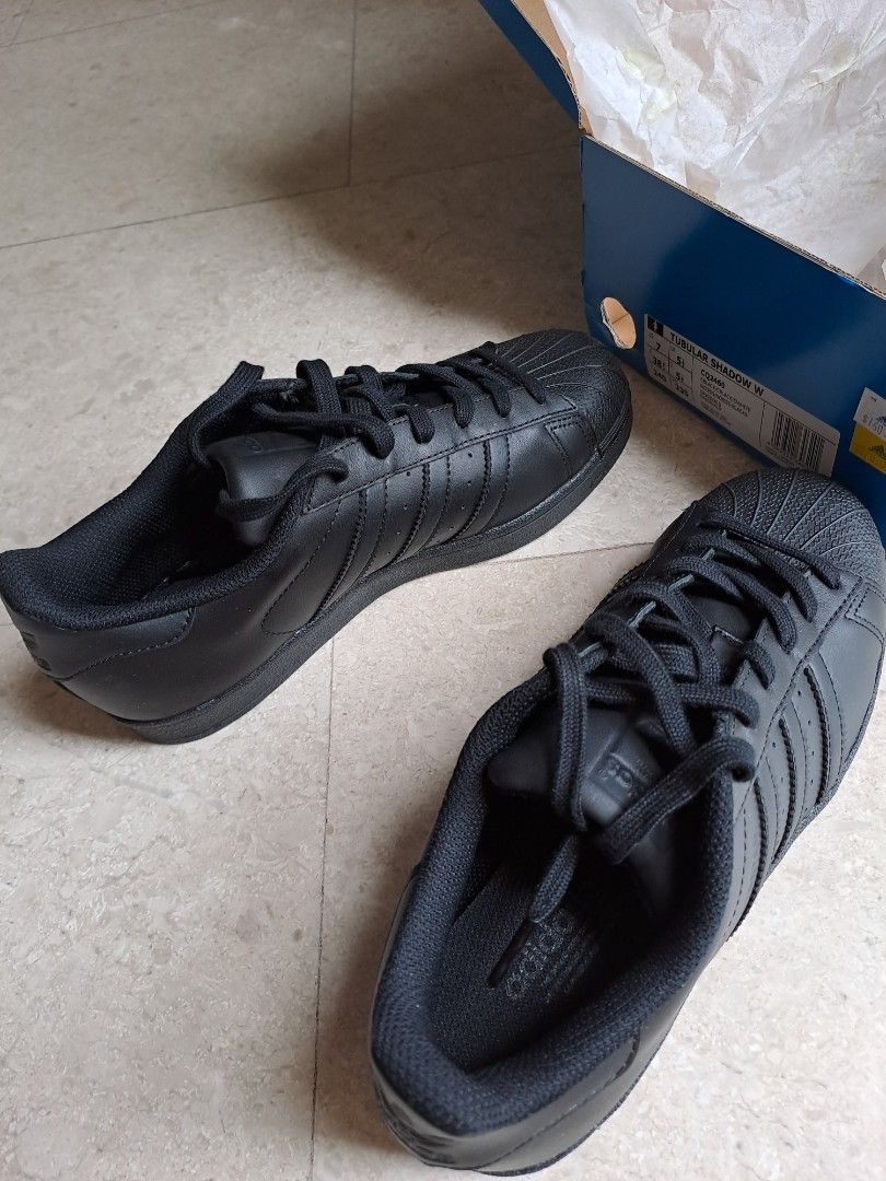 All black adidas tubular womens sale