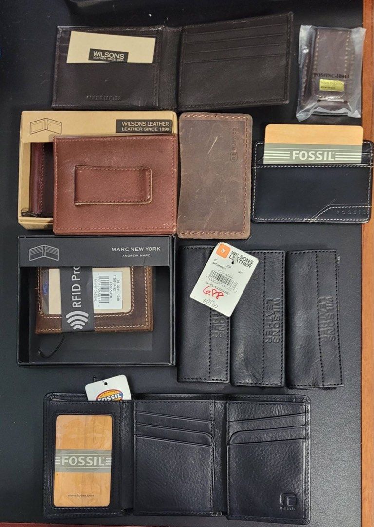 Assorted leather wallets card holder for men (Category: Wallets & Card Holders) located in San Juan City. Submitted by vjncc (Listing ID 1214997279, Image 1). Description: All brand new unused kept in cabinet for a long time but leather is intact. Genuine leather all original bought from USA. With price tags intact as well. Assorted brands. PM FOR PRICES.