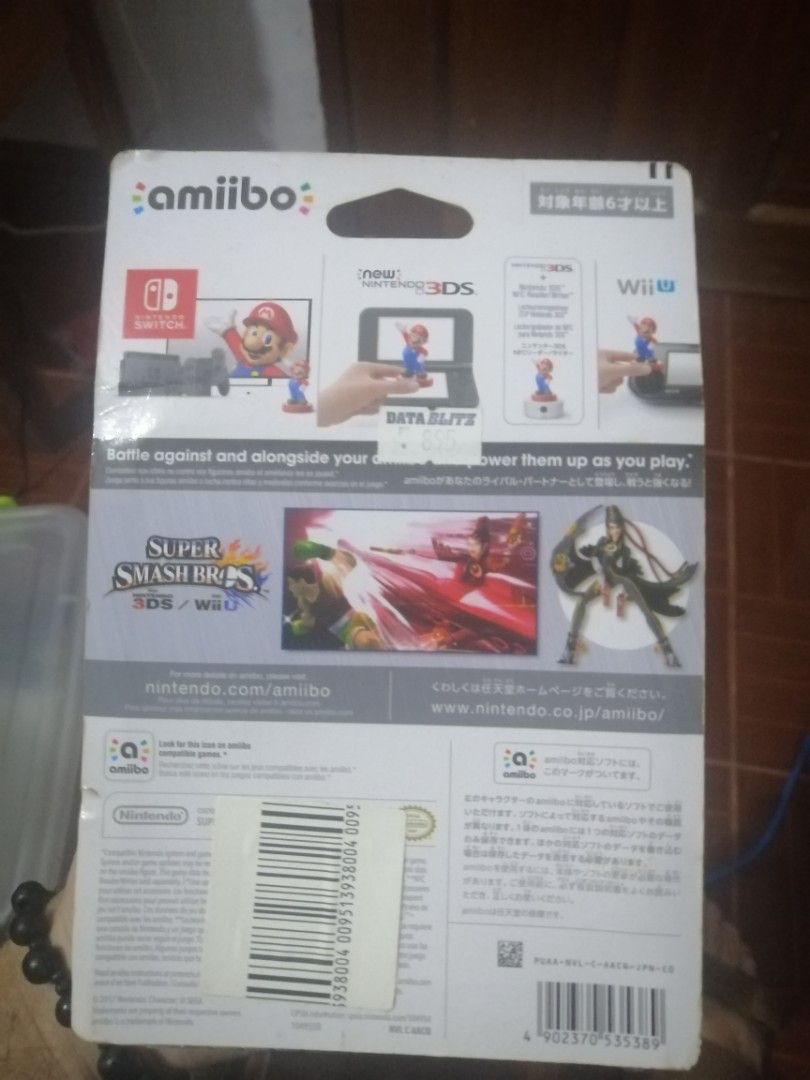BAYONETTA AMIIBO SEALED (Category: Figurines & Statues) located in Nabunturan. Submitted by rollingon22 (Listing ID 1215051403, Image 3). Description: PLEASE NOTE: I am in Mindanao. This is a sealed, Bayonetta player 2 Amiibo. The box has some minor wear, but the figure inside is completely untouched. This Amiibo is pretty rare. .