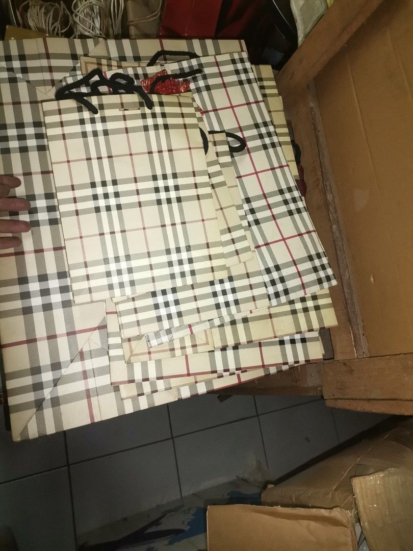 Burberry paper bags (Category: Luxury Accessories) located in Pasay City. Submitted by airaonlineshops (Listing ID 1215028331, Image 2). Description: 10 PCS up AUTHENTIC GOOD CONDITION Mixed sizes FOR take all 5k.