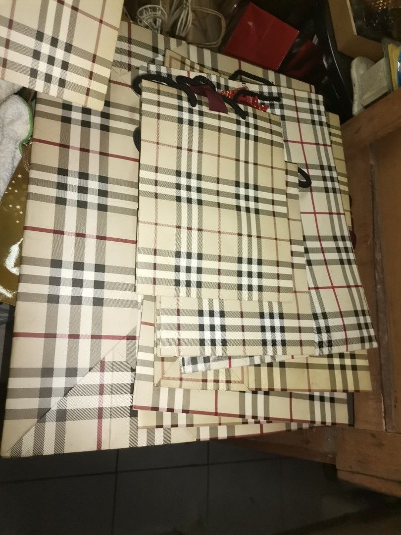Burberry paper bags (Category: Luxury Accessories) located in Pasay City. Submitted by airaonlineshops (Listing ID 1215028331, Image 3). Description: 10 PCS up AUTHENTIC GOOD CONDITION Mixed sizes FOR take all 5k.