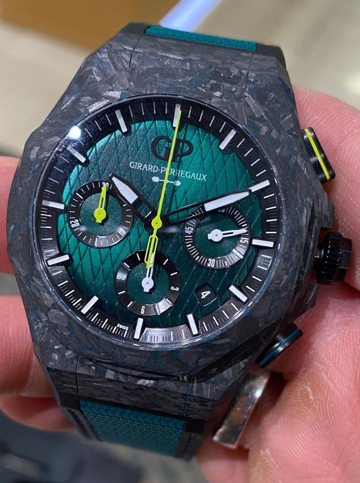 Girard Perregaux Laureato Aston Martin F1 Limited Edition (306 pcs) (Category: Watches) located in Singapore. Submitted by cricol (Listing ID 1215101993, Image 2). Description: 2022 New model Girard-Perregaux Laureato Absolute Chronograph Aston Martin F1 Edition of 306 pieces 81060-41-3071-1CX Case material : titanium & carbon case with carbon extracted from two Formula One️ race cars used during the 2021 season Case-back : sapphire crystal with 
